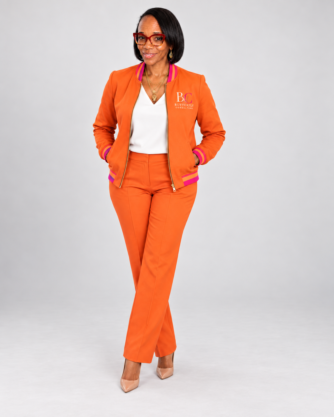 Talia in an orange suit